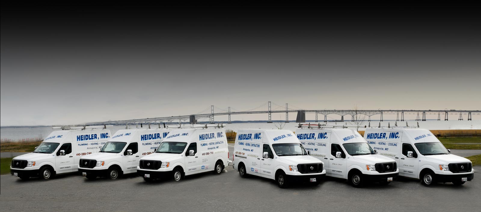 The Heidler, Inc. fleet lined up before the Chesapeake Bay Bridge in Annapolis