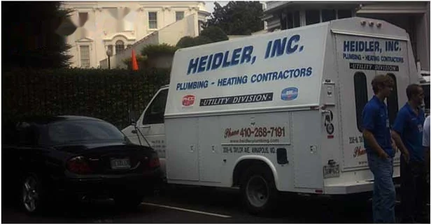 Heidler, Inc. utility division trucks and crew on a commercial job site in Annapolis