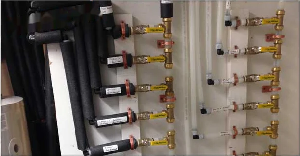 Manifold with labeled shutoff valves after a whole-home repipe